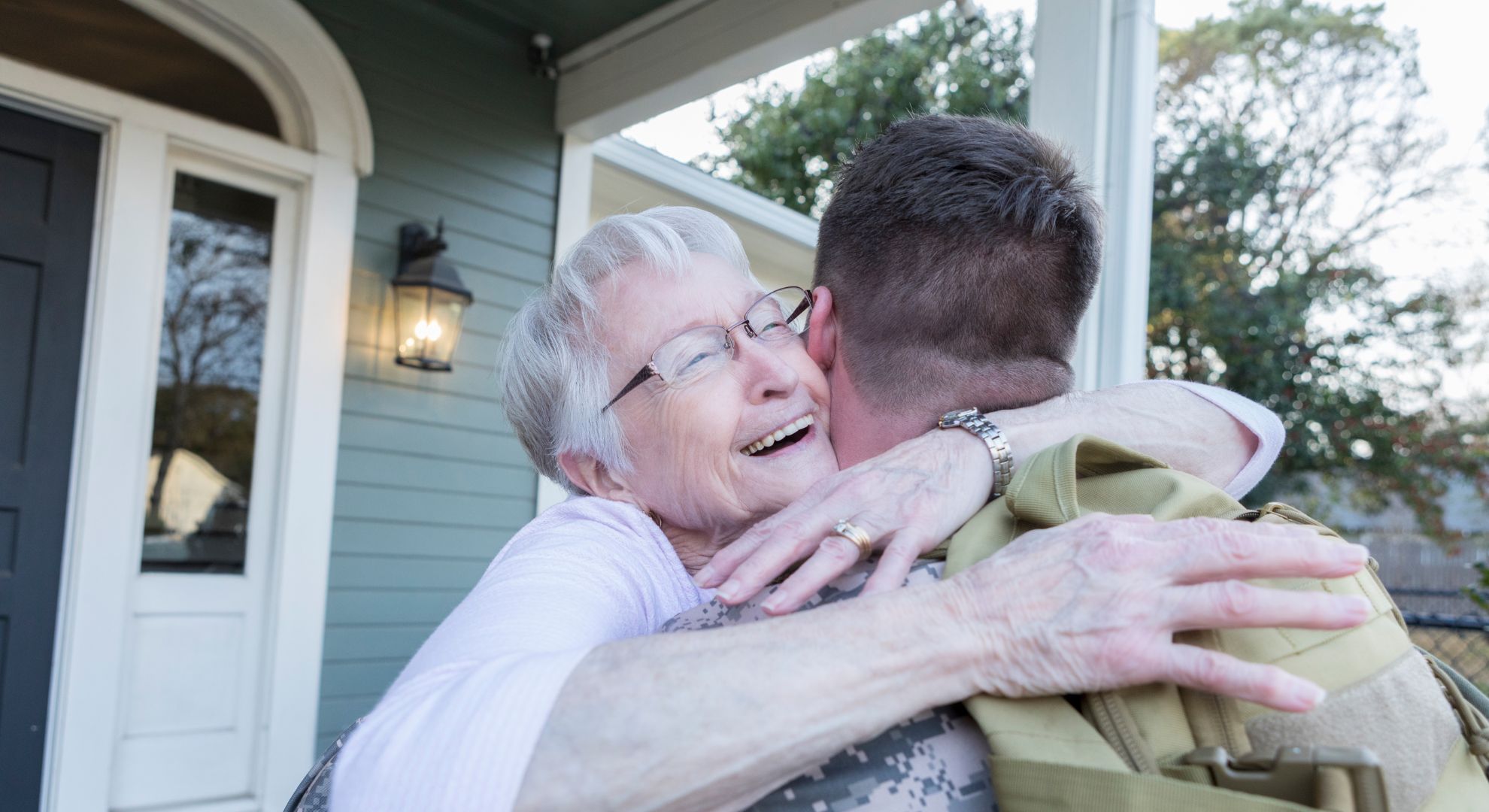Senior mom hugs military son